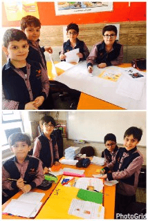 سوم الوند در حال درست كردن روزنامه ديواري